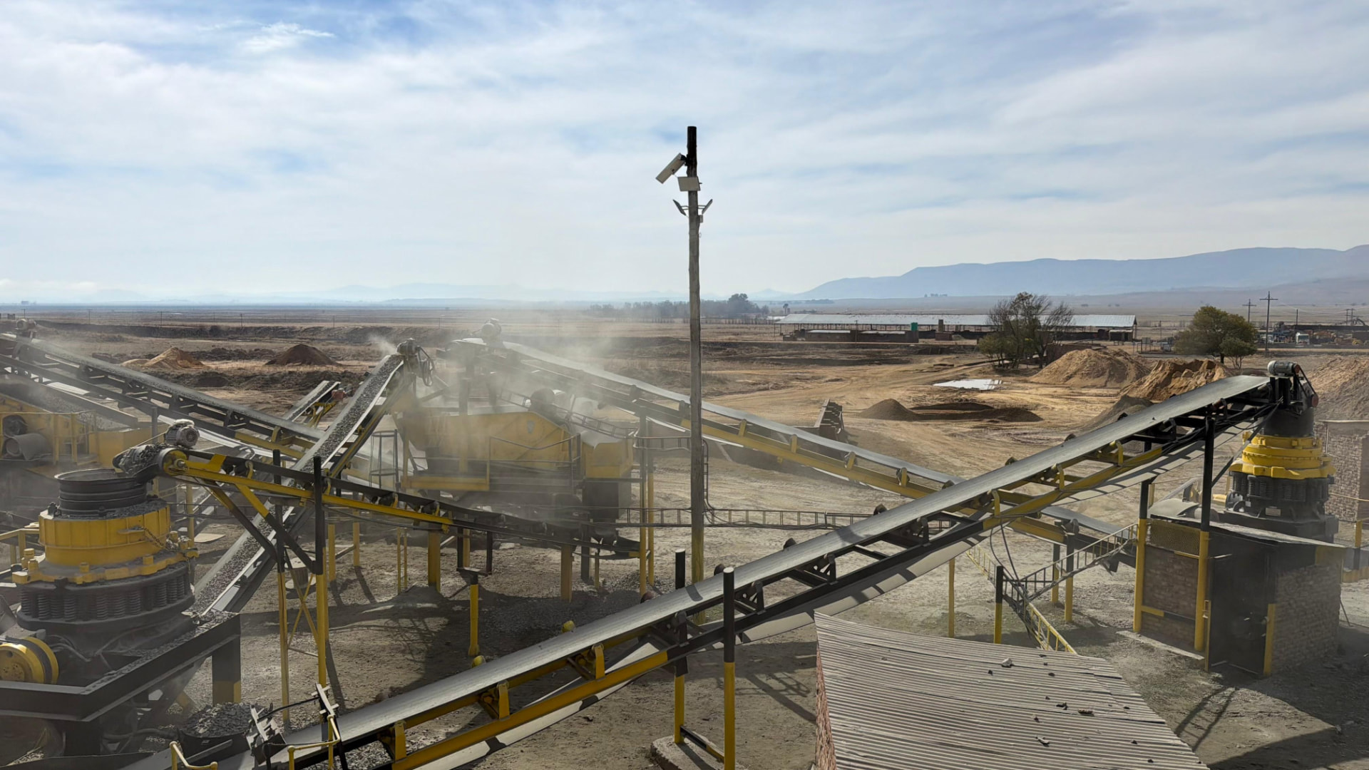 Wide view of the Umvubu Crushers quarry processing plant with conveyors and crushing equipment